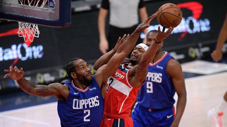 Washington Wizards guard Bradley Beal goes to the basket against Los Angeles Clippers forward Kawhi Leonard