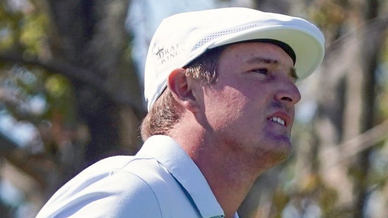 Bryson DeChambeau watcher his shot from the third tee during the final round of the Arnold Palmer Invitational golf tournament Sunday, March 7, 2021, in Orlando, Fla. (AP Photo/John Raoux)