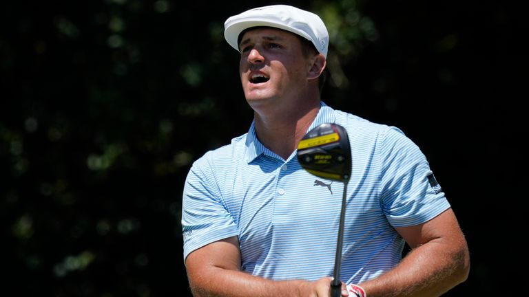 Bryson DeChambeau reacts to his tee shot on the 12th hole during the final round of the Charles Schwab Challenge golf tournament at the Colonial Country Club in Fort Worth, Texas, Sunday, June 14, 2020. (AP Photo/David J. Phillip)