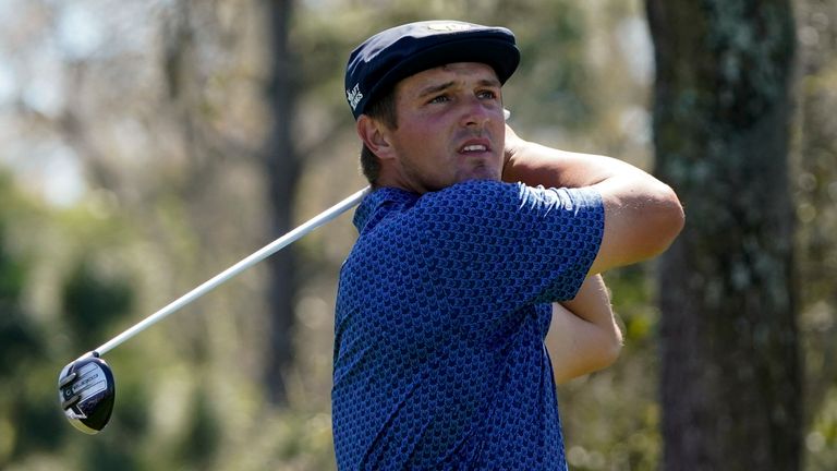 Bryson DeChambeau watches his tee shot on the ninth hole during the second round of the The Players Championship golf tournament Friday, March 12, 2021, in Ponte Vedra Beach, Fla. (AP Photo/John Raoux)