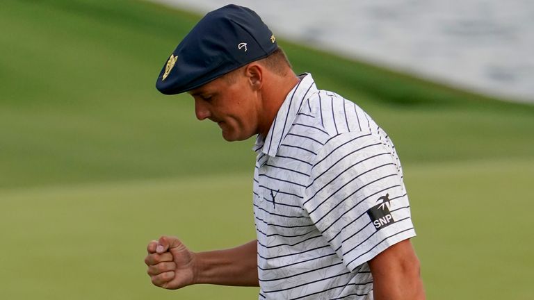 Bryson DeChambeau celebrates after a putt on the 18th hole during the third round of The Players Championship golf tournament Saturday, March 13, 2021, in Ponte Vedra Beach