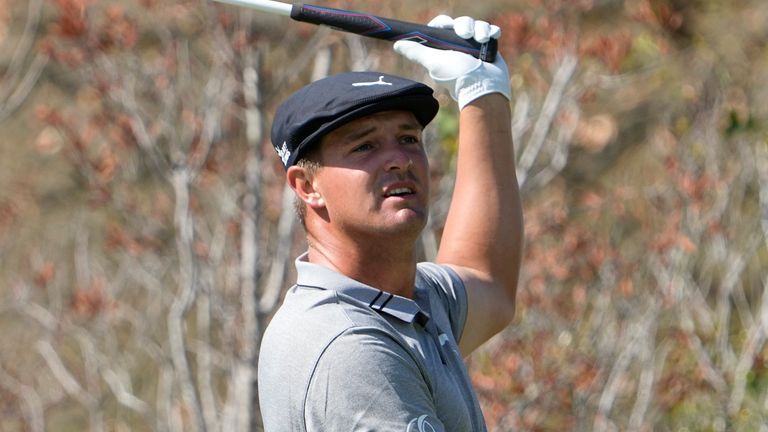 Bryson DeChambeau watches his drive on the No. 5 hole during a third round match at the Dell Technologies Match Play Championship golf tournament Friday, March 26, 2021, in Austin, Texas. (AP Photo/David J. Phillip)