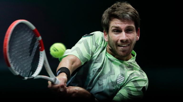 Britain's Cameron Norrie plays a shot against Russia's Karen Khachanov (AP Photo/Peter Dejong)