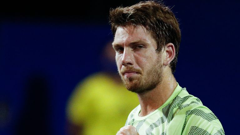 Britain's Cameron Norrie pumps his fist as he celebrates a point on his way to defeating Italy's Fabio Fognini at the Mexican Open tennis tournament in Acapulco, Mexico, Wednesday, March 17, 2021. (AP Photo/Rebecca Blackwell)