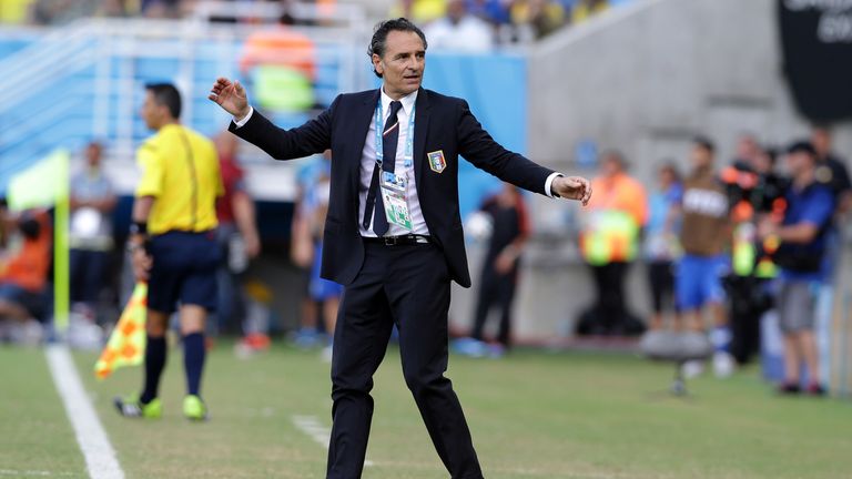 AP - Italy's head coach Cesare Prandelli gestures during the group D World Cup soccer match between Italy and Uruguay at the Arena das Dunas in Natal, Brazil, Tuesday, June 24, 2014. Uruguay edged 10-man Italy 1-0 to reach the second round of the World Cup. (AP Photo/Antonio Calanni)