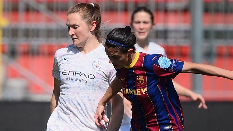 Barcelona midfielder Alexia Putellas challenges Manchester City's Sam Mewis