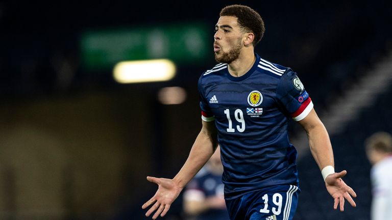 Che Adams celebrates scoring his first Scotland goal