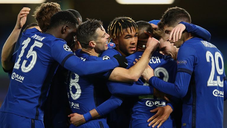 Hakim Ziyech is mobbed by his team-mates after giving Chelsea the lead against Atletico Madrid at Stamford Bridge