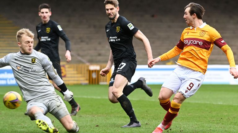 MOTHERWELL, SCOTLAND - MARCH 06: Motherwell's Christopher Long (R) makes it 3-1 to his side during a Scottish Premiership match between Motherwell and Livingston at Fir Park, on March 06, 2021, in Motherwell, Scotland. (Photo by Rob Casey / SNS Group)