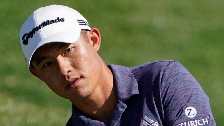 Collin Morikawa chips to the green  on the ninth hole during the first round of the The Players Championship golf tournament Thursday, March 11, 2021, in Ponte Vedra Beach, Fla. (AP Photo/John Raoux)