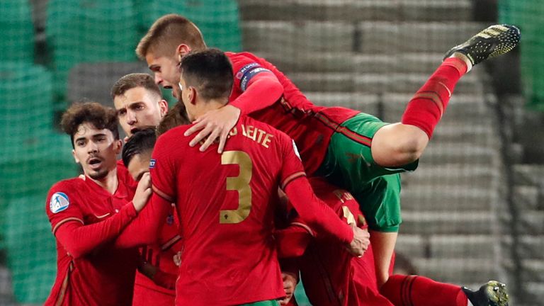 Portugal's Dany Mota celebrates with teammates after scoring against England U21