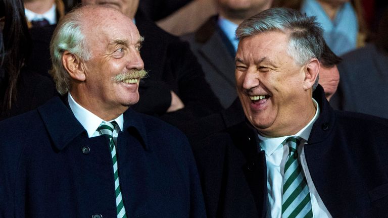Celtic majority shareholder Dermot Desmond (left) speaks to outgoing chief executive Peter Lawwell (right)