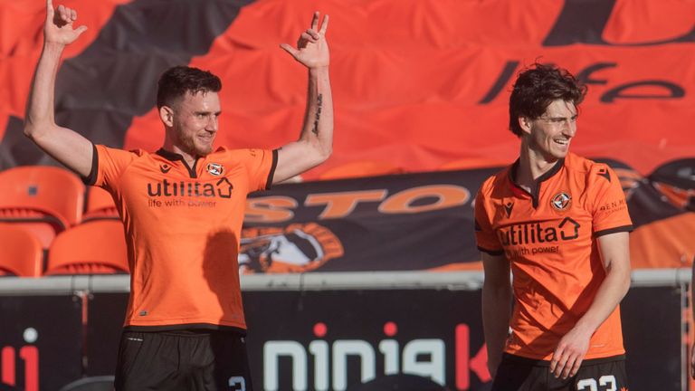 Dundee United's Adrian Sporle celebrates making it 1-0 at Tannadice