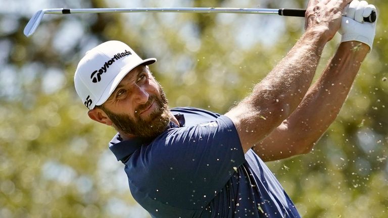 Dustin Johnson hits his tee shot on the No. 7 hole during a third round match at the Dell Technologies Match Play Championship golf tournament Friday, March 26, 2021, in Austin, Texas. (AP Photo/David J. Phillip)