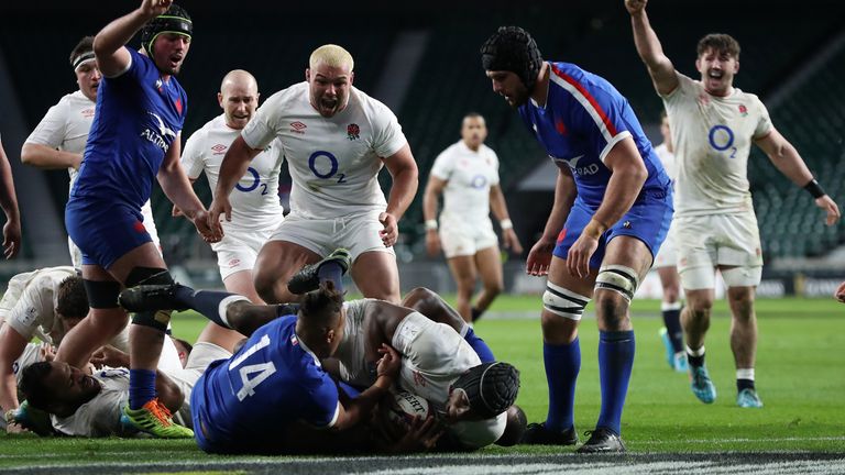 Maro Itoje of England scores their side's second try under pressure from Teddy Thomas of France as Ellis Genge celebrates during the Guinness Six Nations match between England and France at Twickenham Stadium on March 13, 2021 in London, England. . (Photo by David Rogers/Getty Images)