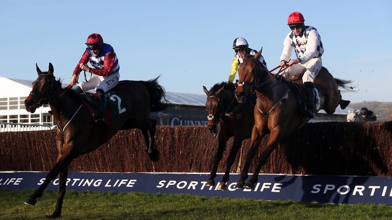 Galvin (right) on his way to victory under Jack Kennedy in the National Hunt Chase