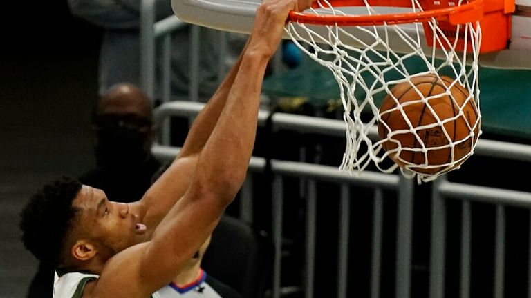 AP - Milwaukee Bucks' Giannis Antetokounmpo dunks