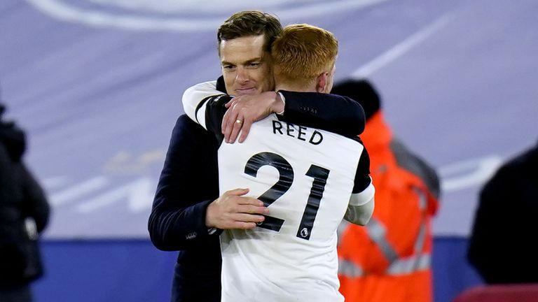 Scott Parker hugs Harrison Reed as they celebrate Fulham's win over Sheffield United