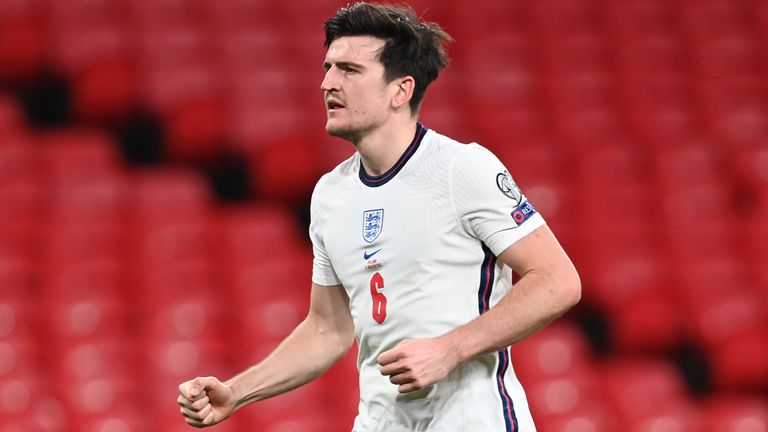 Harry Maguire celebrates his winner against Poland