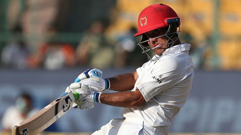 Associated Press - Afghanistan's Hashmatullah Shahidi bats during the second day of one-off cricket test match against India in Bangalore, India, Friday, June 15, 2018. (AP Photo/Aijaz Rahi)