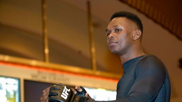 AP - UFC middleweight champion Israel Adesanya, of Nigeria, prepares for a UFC 248 open workout,