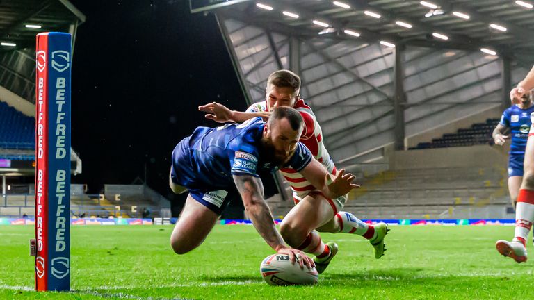 Picture by Alex Whitehead/SWpix.com - 26/03/2021 - Rugby League - Betfred Super League - Leigh Centurions v Wigan Warriors - Emerald Headingley Stadium, Leeds, England - Wigan's Jake Bibby scores a try.