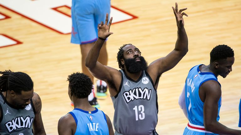 Brooklyn Nets guard James Harden prepares to start prior to the first half of an NBA basketball game against the Houston Rockets