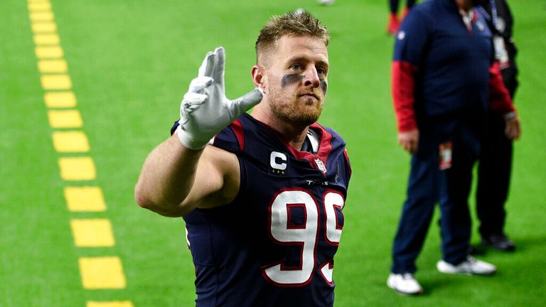 AP -  Houston Texans defensive end (99) waves to fans as he walks off the field after an NFL football game