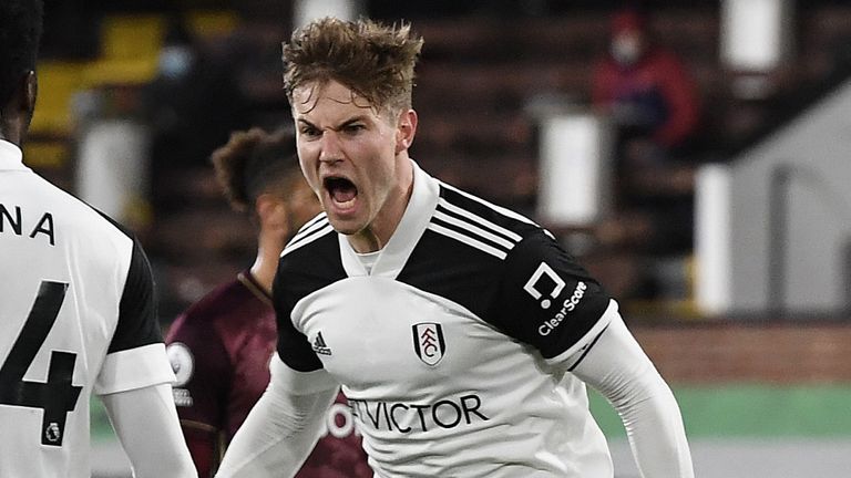 Joachim Andersen roars in celebration after scoring Fulham's equaliser
