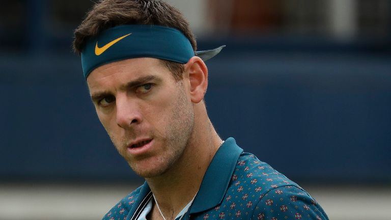 Juan Martin del Potro of Argentina celebrates winning a point against Denis Shapovalov of Canada during their singles match at the Queens Club tennis tournament in London, Wednesday, June 19, 2019. (AP Photo/Kirsty Wigglesworth)