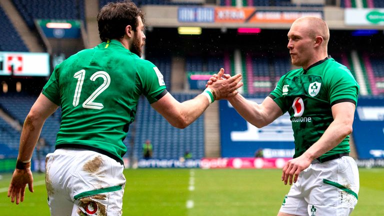 Keith Earls congratulates Robbie Henshaw after scoring Ireland's opening try