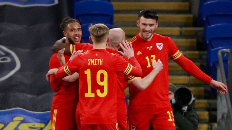 Kieffer Moore is congratulated after scoring Wales' opening goal 