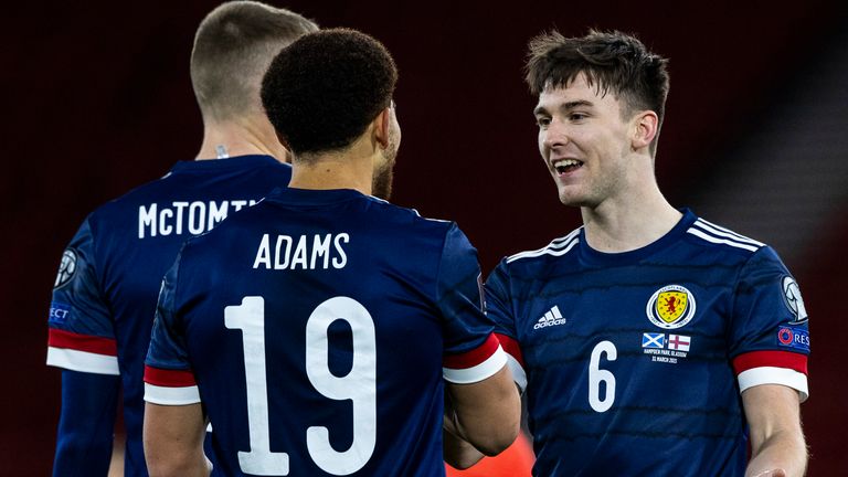 GLASGOW, SCOTLAND - MARCH 31: Che Adams celebrates with Kieran Tierney after scoring to make it 3-0 Scotland during a World Cup qualifier between Scotland and the Faroe Islands at Hampden Park, on March 31, 2021, in Glasgow, Scotland. (Photo by Craig Williamson / SNS Group)