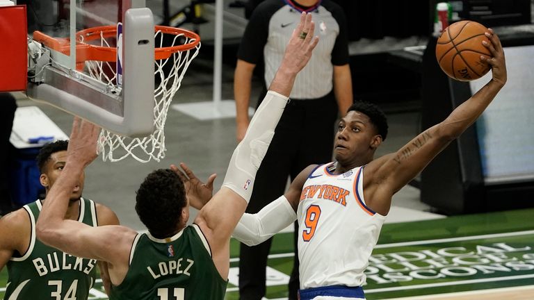 New York Knicks&#39; RJ Barrett dunks past Milwaukee Bucks&#39; Brook Lopez