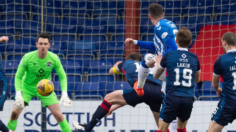 DINGWALL, SCOTLAND - MARCH 06: Kilmarnock's Kyle Lafferty strikes to make it 1-0 during a Scottish Premiership match between Ross County and Kilmarnock at the Global Energy Stadium, on March 06, 2021, in Dingwall, Scotland. (Photo by Ross Parker / SNS Group)