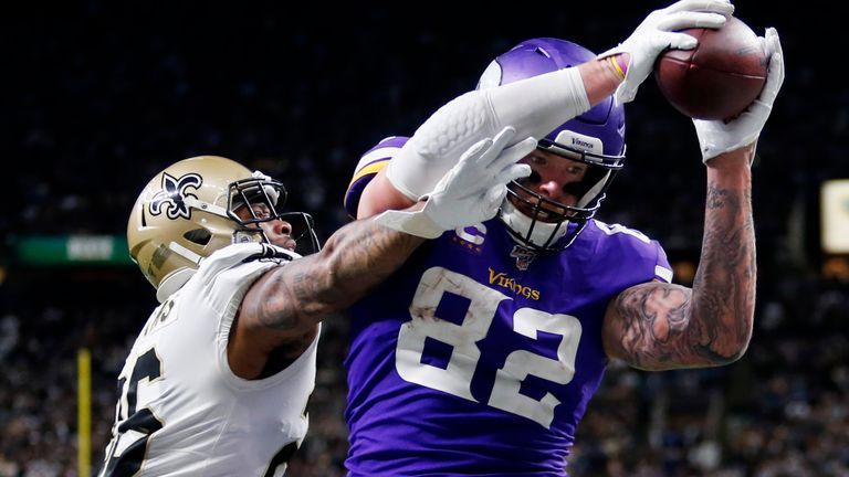 Minnesota Vikings tight end Kyle Rudolph (82) pulls in the game winning touchdown pass over New Orleans Saints cornerback P.J. Williams during overtime of an NFL wild-card playoff football game, Sunday, Jan. 5, 2020, in New Orleans. The Vikings won 26-20. (AP Photo/Brett Duke)
