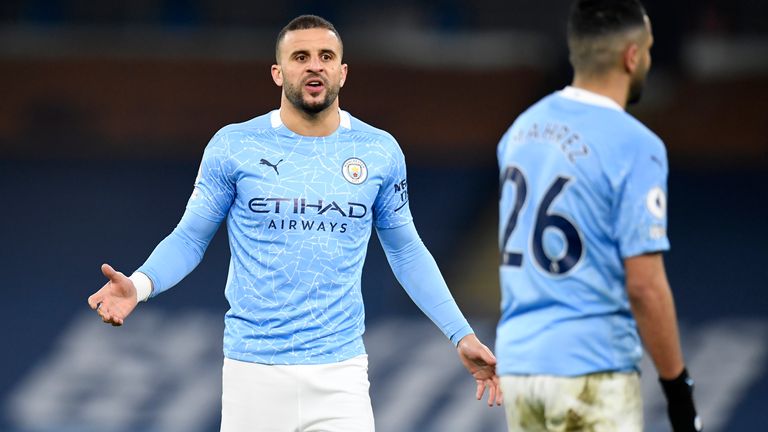 Kyle Walker gestures to team-mate Riyad Mahrez with his team losing to Man Utd (AP)