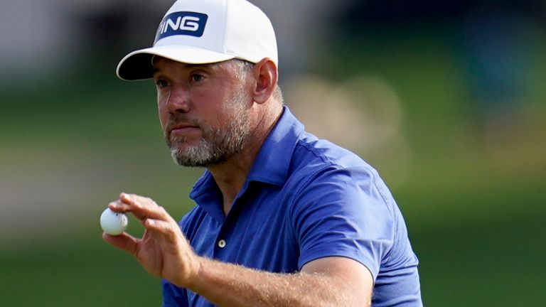 Lee Westwood, of England, waves after making a putt on the 12th hole during the third round of The Players Championship golf tournament Saturday, March 13, 2021, in Ponte Vedra Beach, Fla. (AP Photo/Gerald Herbert)