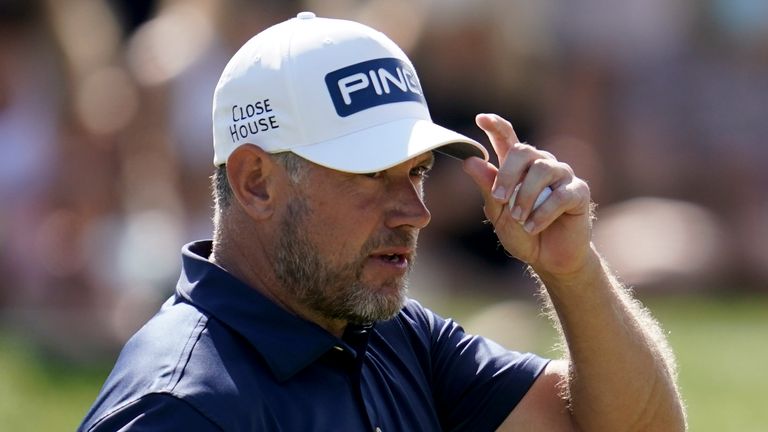 Lee Westwood, of England, waves after a birdie on the ninth hole during the final round of The Players Championship golf tournament Sunday, March 14, 2021, in Ponte Vedra Beach, Fla. (AP Photo/Gerald Herbert)     