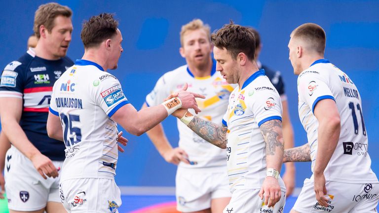 Picture by Allan McKenzie/SWpix.com - 27/03/2021 - Rugby League - Betfred Super League Round 1 - Wakefield Trinity v Leeds Rhinos - Emerald Headingley Stadium, Leeds, England - Leeds&#39;s Richie Myler is congratulated on scoring a try against Wakefield.