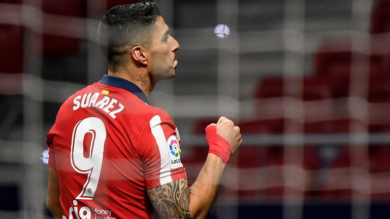 Luis Suarez celebrates during Atletico Madrid's win