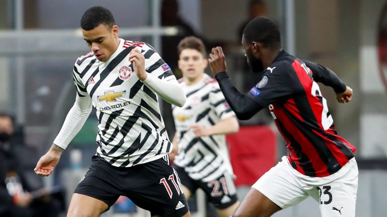 Mason Greenwood and Fikayo Tomori battle for the ball in the Europa League