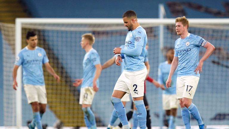 Manchester City's Kyle Walker and Kevin De Bruyne (right) appears dejected after the final whistle during the Premier League match at the Etihad Stadium, Manchester. Picture date: Sunday March 7, 2021.
