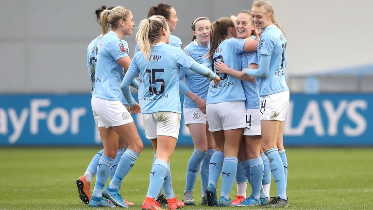 Manchester City&#39;s Keira Walsh (second right) celebrates scoring their side&#39;s first goal