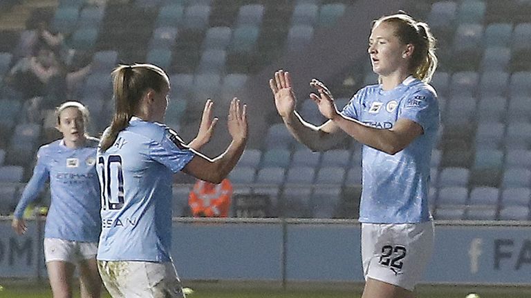 Manchester City's Sam Mewis celebrates with team-mate Georgia Stanway