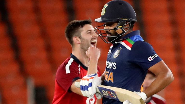 Mark Wood dismisses Rohit Sharma (Associated Press)