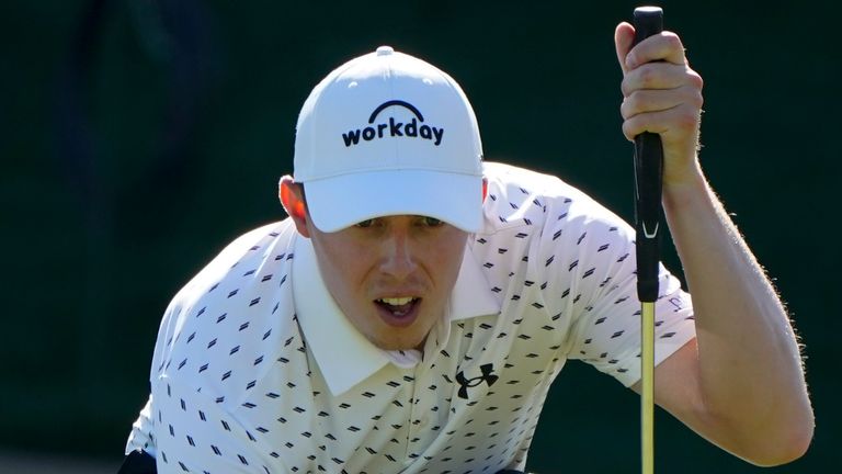 Matthew Fitzpatrick, of England, lines up a putt on the 18th hole during the second round of the The Players Championship golf tournament Friday, March 12, 2021, in Ponte Vedra Beach, Fla. (AP Photo/Gerald Herbert)