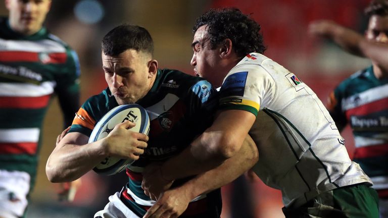 Matt Scott  is tackled by London Irish's Agustin Creevy