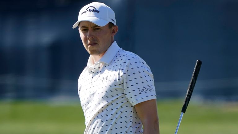 Matthew Fitzpatrick, of England, reacts after missing a putt on the 16th hole during the second round of the The Players Championship golf tournament Friday, March 12, 2021, in Ponte Vedra Beach, Fla. (AP Photo/Gerald Herbert)