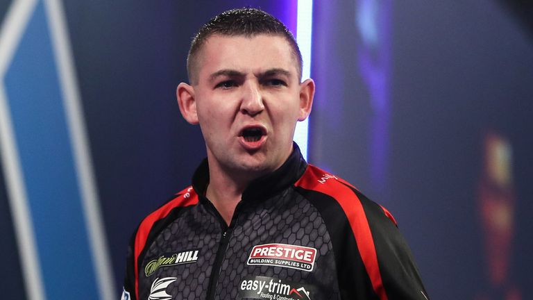 Nathan Aspinall celebrates during day eleven of the William Hill World Darts Championship 